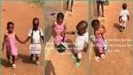 Little boy frowns face while escorting girl to her house in video: "He caught her with another guy"