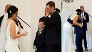 Groom weeps in video as bride includes his son in her vows to him during their wedding