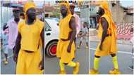 Ras Nene walks confidently in yellow outfit in video; gets many laughing