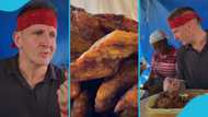 Obroni man visits Ghana, delights as he tries local dishes: "He needs a Ghana Card"