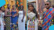 Anita Sefa Boakye’s junior brother’s stirs debate with ‘tight’ kente cloth as he poses with his sisters
