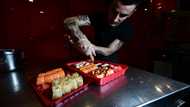 'War is war' but Ukraine sushi bar serves lunch on time