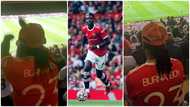 Video of Burna Boy playing Black Sheriff's 2nd Sermon at Old Trafford while going to watch Man Utd pops up