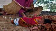 Flood-born: Nothing but mud as mother, infant return to Pakistan home
