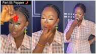 Pretty lady goes viral as she rubs fresh habanero pepper on her lips to make them plump naturally