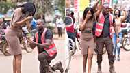 Beautiful photos and video drop as man blocks traffic on busy highway to propose to girlfriend