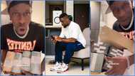 Shatta Wale debunks claims he wants to be like Sarkodie, shows stacks of cash