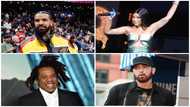 A list of 15 rappers with the most number 1 hits and their respective songs