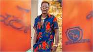 True love: Diehard fan tattoos 1 Don and SM For Life on her body to honour Shatta Wale in video