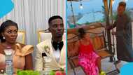 Romantic Mmebusem spends quality with wife, swings her gently on a swinging chair