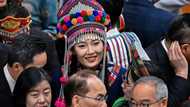 China's elite don traditional garb for annual 'Two Sessions' talking shop
