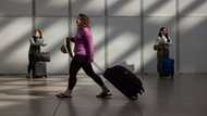 US trade gap drops sharply in July on lower imports