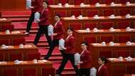 China caps key political meet with pledges to boost ailing economy
