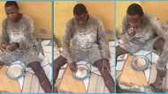 Ghanaian man eats banku with chocolate drink: “what a combination”