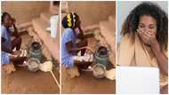 Video captures GH lady in her feelings as hot banku she was stirring drops on the ground