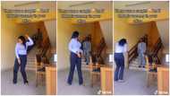 Pretty lady in long sleeves shows off sweet dance moves at office, her male boss catches her in video