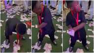 He will be a politician: Little boy videoed picking money at occasion in style