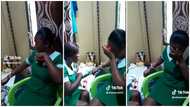 Pretty Ghanaian nurse weeps like a baby as she receives injection, video stirs reactions