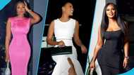 Ghanaian lawyer Sandra Ankobiah looks gorgeous in a white two-piece outfit and designer bag