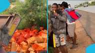 Residents on the Tema motorway rush for alcoholic drinks following crash of a truck loaded with beer