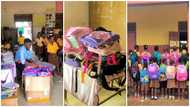 Ghanaian teacher delights as his students receive school bags as donation, nine adorable photos melt hearts