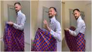 White man ties wrapper, acts like his Nigerian wife in funny video: "She don spoil the Oyinbo finish"