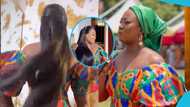 Stacy Amoateng looks classy in a corseted kente gown with rhinestones to host an event at Manhyia Palace