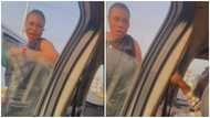Ghanaian woman and taxi driver captured arguing in the middle of the road, video stir reactions
