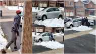Drama as thief gets stuck in snow after attempted robbery, husband offers to help him escape as wife calls police (video)