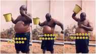 Man with 'football' belly captured in video complaining of heat & pouring bucket of water on him
