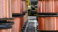 Asian markets slump as traders take profits, eye commodities' spike