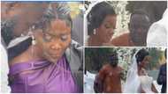 Ghanaian bride goes viral as she weds in a wet gown and ruined makeup while reciting her vows in the rain; Netizens react