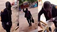 Meet the man who wears suit and tie along with briefcase to sell bofrot; video emerges