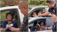 Police officers in US randomly stop people on the road, give them GHC600 for X'mas in video