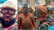 Kind Ghanaian man surprises market trader, buys out all her items, video evokes joy