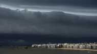 Swiss Re warns insured disaster losses could double in a decade