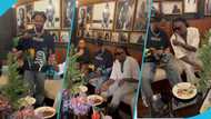 Fameye and Stonebwoy chill together as they enjoy many sticks of kebab at Dr Louisa's birthday party