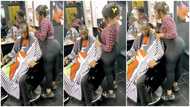 Video of voluptuous female barber in skin tight showing her skills causes stir online