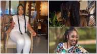 Ghanaian socialite Moesha Boduong goes tops as she works as a waitress at a beach resort