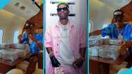 Shatta Wale flaunts numerous bundles of cash in a luxurious private jet