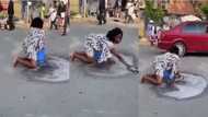 Video of woman washing a road with soap and water goes viral; Ghanaians react