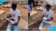 WASSCE 2024: SHS graduate kneels in front of NPP billboard to thank Akufo-Addo after passing his exams