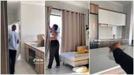 Lady happily shows off her new apartment and flaunts its impressive features