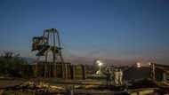 Relatives of trapped Mexican miners pray for miracle