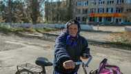 War and peace collide in Ukraine's recaptured ruins