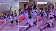 Na juju? Young man causes stir at event as he holds a bench with only his teeth while doing legwork in video