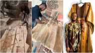 Creative man makes Agbada from wood; cute photos pop up online as internet reacts