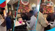 Young man cries as his girlfriend of 5 years dumps him for an older man at pizza restaurant