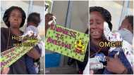 Homeless mum with kid by roadside tries to sell artwork for GH¢36, man buys it for over GH¢3k in video