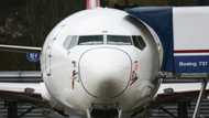 Mired in crisis, Boeing reports another loss